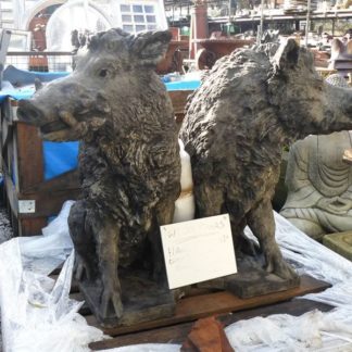 Two wild boar statues