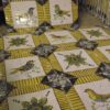 Hand painted bird and patterned tiles
